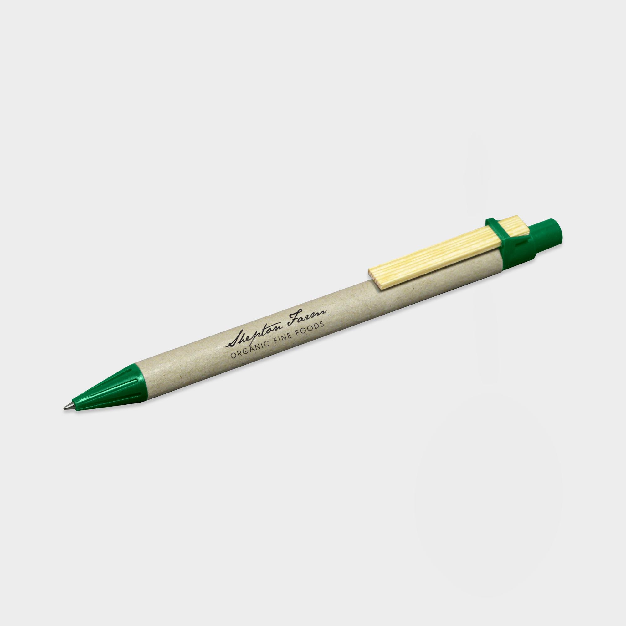 The Green & Good Recycled Card Pen. An eco-friendly pen made from natural recycled cardboard and a wooden clip. Various trim colours available. Made in Germany and comes as standard with blue ink. Green