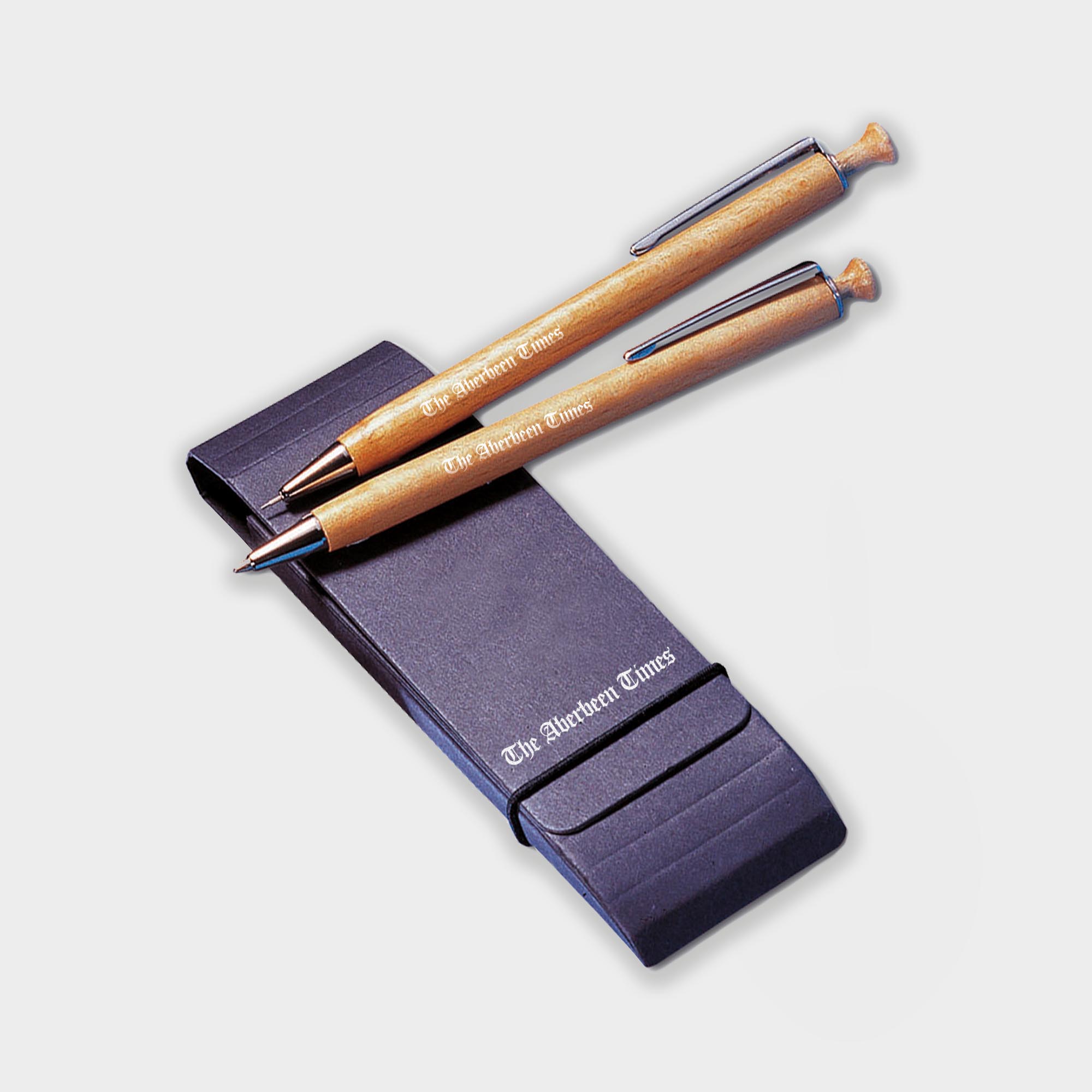 The Green & Good Albero Executive Pen and Pencil Set. Consisting of a sustainable timber pen & pencil. Both come inside a black recycled card wallet.
