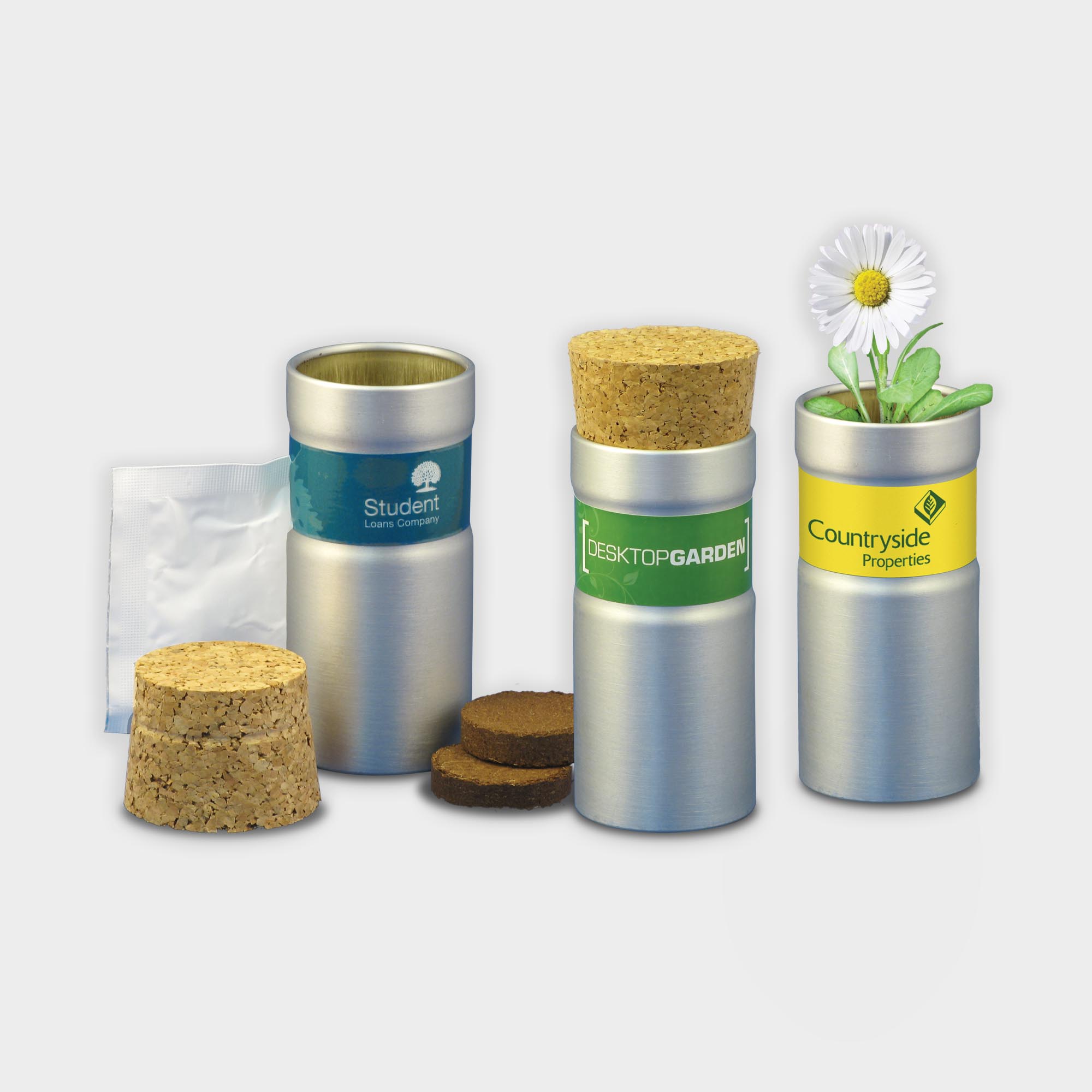 The Green & Good Desktop Garden Tube comes with a soil tablet & seed balls. It is made from part-recycled aluminium with a cork stopper and can be personalised with a digital sticker. Available in silver brushed or matt black finish.